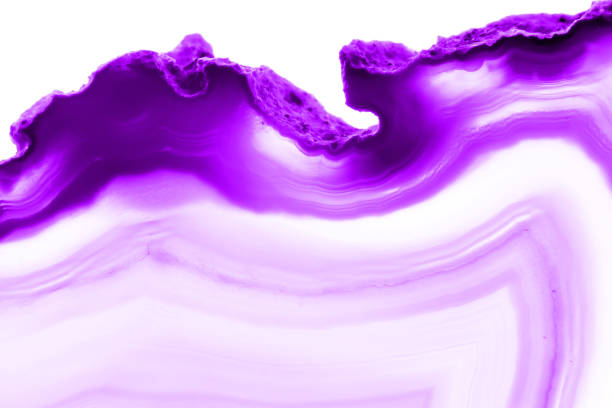 istock Ultra violet pruple agate mineral cross section isolated on white background. Abstract background 896768764