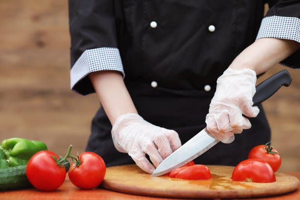 istock The cook cuts fresh farm vegetables 896777252