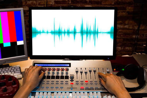 istock male sound engineer hands control digital sound mixer workstation in tv station editing studio 896777832