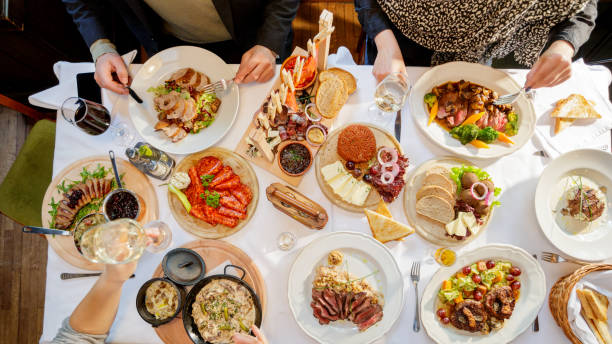 istock Directly above view of group of people having lunch 896783028