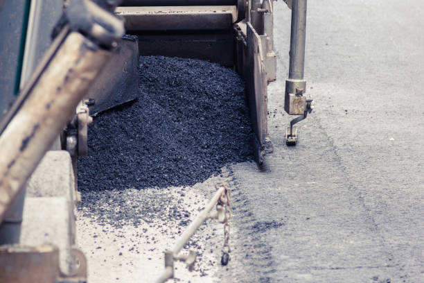 istock Tractor, roller on the road repair site. Road construction equipment. 896783336