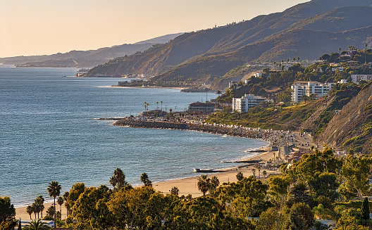 View of California coast and beach with mountains background