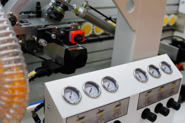 istock closeup view of the edge banding machine 896787842