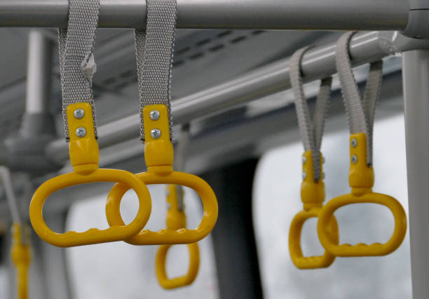 istock Hand holders in bus without people in it 896788438
