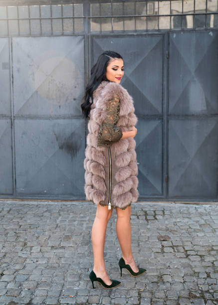 istock Young elegant woman wearing fur coat 896814816