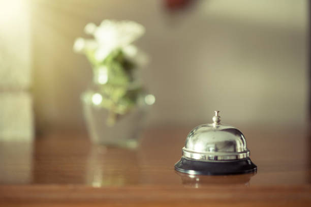 istock Vintage bell on reception desk on sunset. 896822784