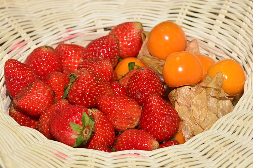 Strawberry and Cape Gooseberry in Bamboo basket