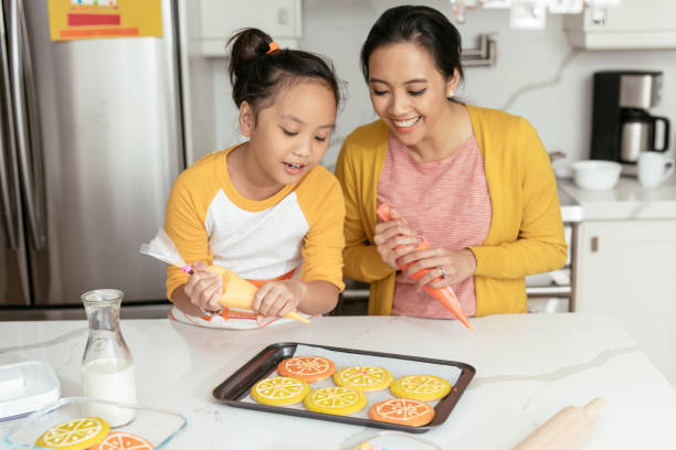 istock Mother and daughter at home 896832018