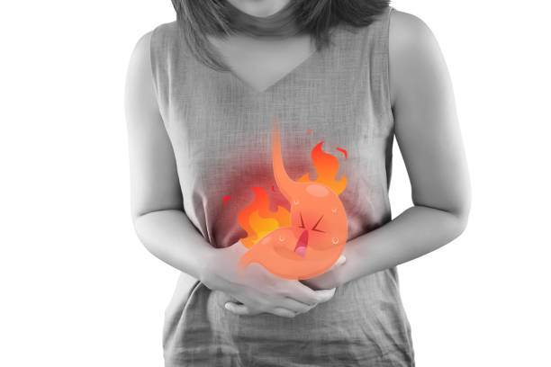 The Photo Of Cartoon Stomach On Woman's Body Against White Background, Acid Reflux Disease Symptoms Or Heartburn, Concept With Healthcare And Medicine The Photo Of Cartoon Stomach On Woman's Body Against White Background, Acid Reflux Disease Symptoms Or Heartburn, Concept With Healthcare And Medicine gastroenteritis stock pictures, royalty-free photos & images