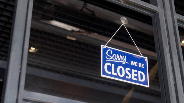 istock Closed sign on the shop's window 896837460