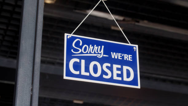 istock Closed sign on the shop's window 896837514