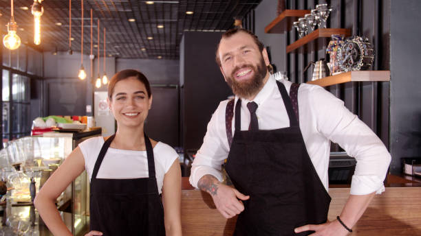 istock Coffee shop business team posing 896837658