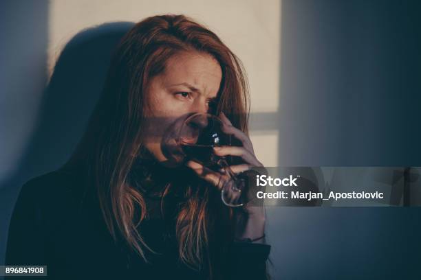 Drunk Woman Drinking Wine Alone And Depressed Stock Photo - Download Image Now - Alcohol - Drink, Alcohol Abuse, Women