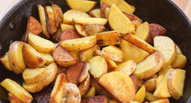 istock roasted potatoes with a golden crust 896842938