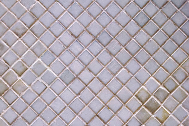 istock A wall from ceramic pieces white color for background. 896849530