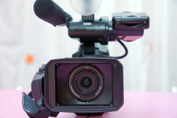 istock Professional video camera isolated. Professional full HD camcorder 896870948