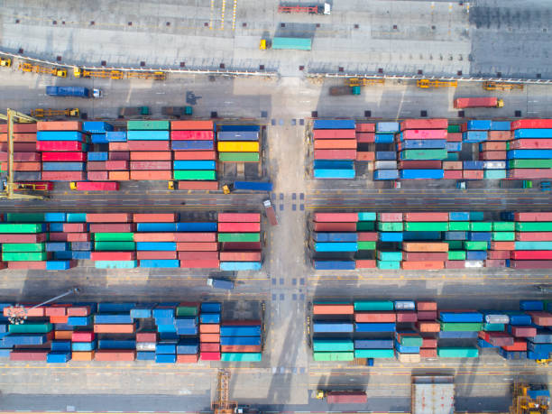 istock container,container ship in import export and business logistic,By crane,Trade Port , Shipping,cargo to harbor.Aerial view,Water transport,International,Shell Marine,transportation,logistic,trade,port 896877846
