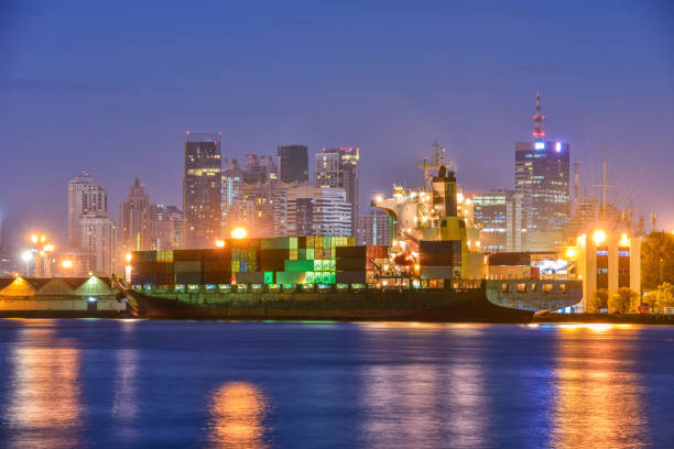 istock container,container ship in import export and business logistic,By crane,Trade Port , Shipping,cargo to harbor.Aerial view,Water transport,International,Shell Marine,transportation,logistic,trade,port 896877860