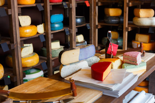 istock Grocery shop interior. Shelves and counter with cheese 896877884