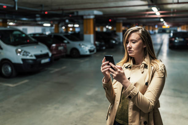 istock Texting in the subway parking lot 896886554