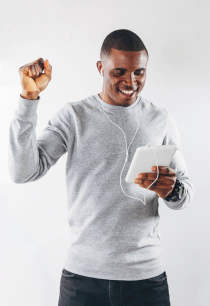 istock Portrait of young men using digital tablet 896897162