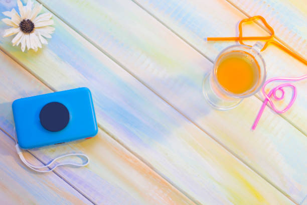 istock Vacation items on a colored wooden table 896903206