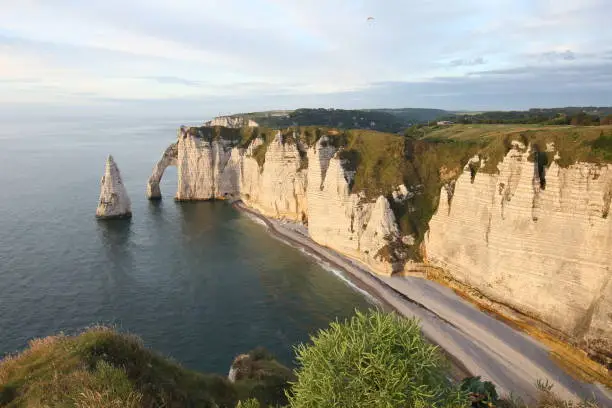 Photo of Paragliding over chalk cliffs of Etretat