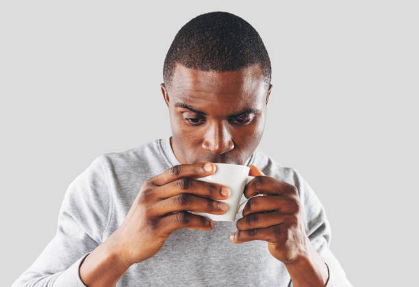istock Afro man enjoying cup of coffee 896906742