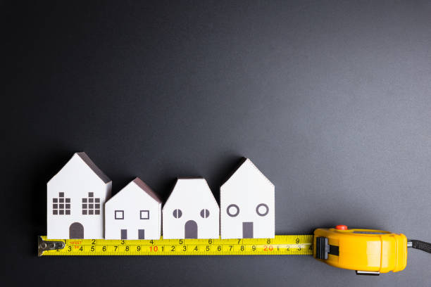 istock White house toy and construction tools on black background with copy space.Real estate concept, New house concept, Finance loan business concept, Repair maintenance concept. 896909612