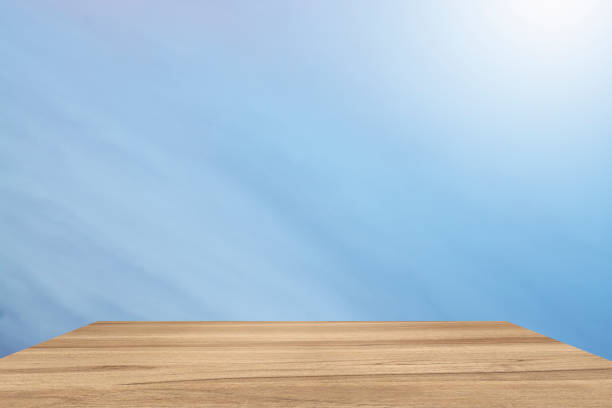 istock Empty perspective room with sparkling blue sky lighting. Template mock up for display of your product. 896912290