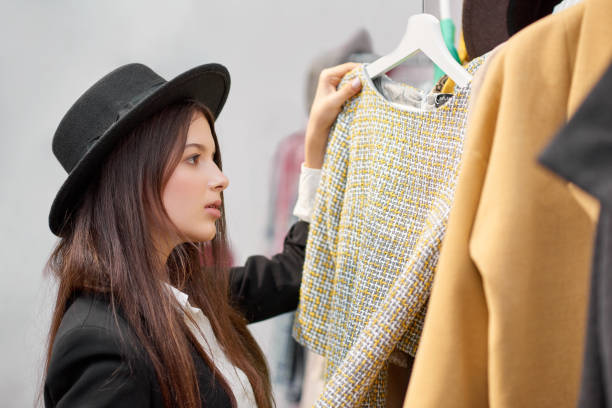 istock Young woman shopping for clothes 896913098