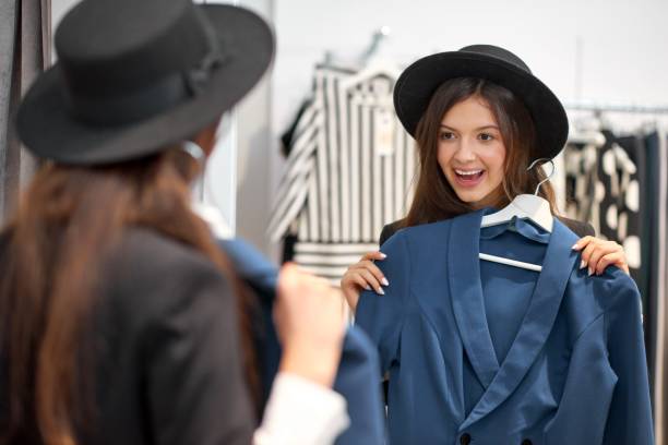 istock Young woman shopping for clothes 896913196