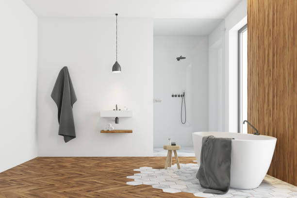 istock White and dark wooden bathroom interior side 896916604