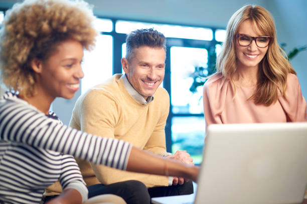 istock A group of colleagues working together at the office 896916662