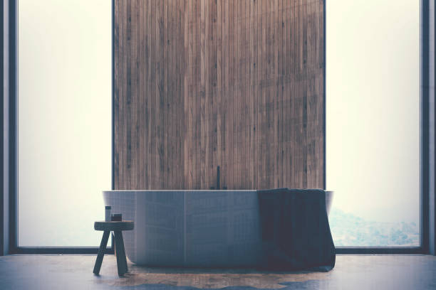 istock Gray and wooden bathroom close up toned 896919902