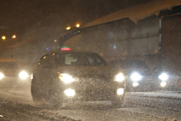 istock snowfall on the evening streets. blur specifically enhance movement 896922446