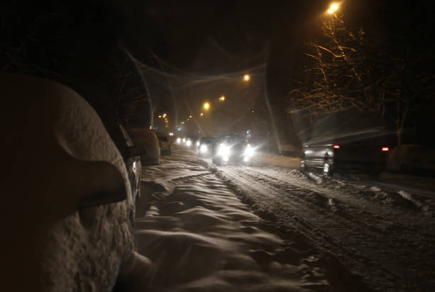 istock snowfall on the evening streets. blur specifically enhance movement 896922884