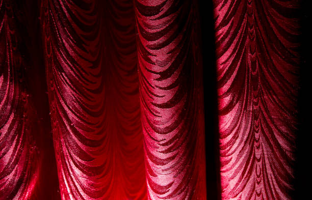 istock Red curtain as an abstract background 896926560