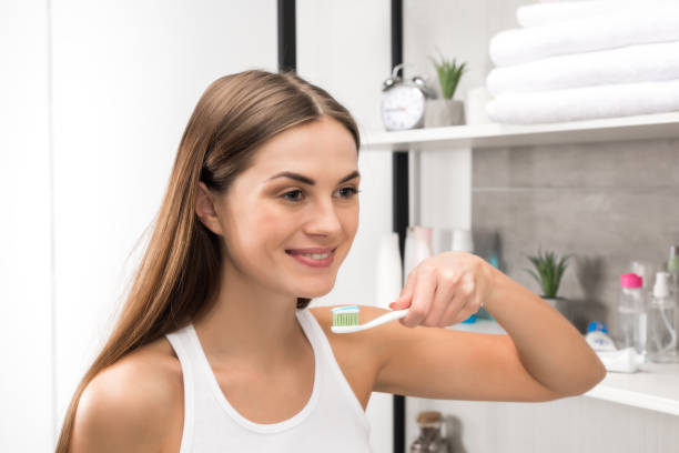 istock girl going to brush teeth 896929758