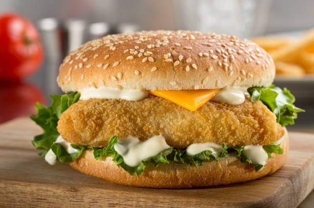 fischburger - cod fillet fried prepared fish stock-fotos und bilder