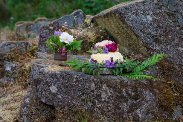 istock Nature Styled Wedding Cake on River Rock 896930980