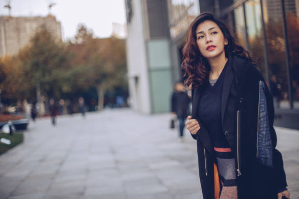 istock Beautiful woman downtown 896939572