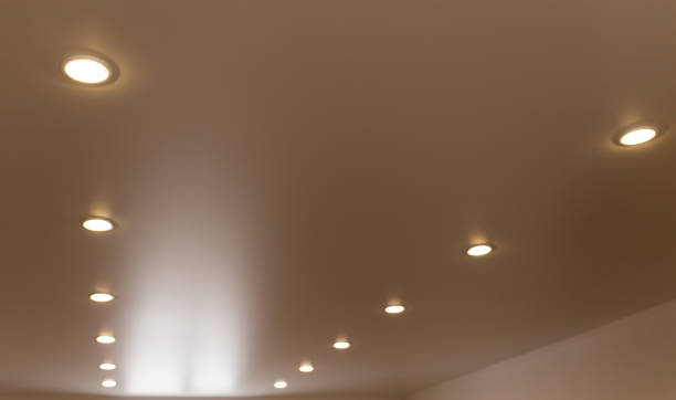 istock lamps on a stretch ceiling in a room 896944016