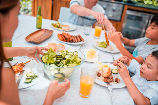 istock Family enjoying lunch 896949006