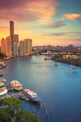 Cityscape image of Brisbane skyline, Australia during dramatic sunset.