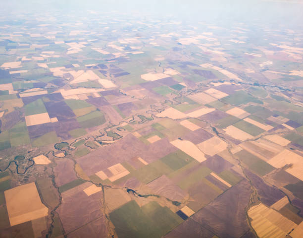 istock surface of the earth from the airplane window 896962652