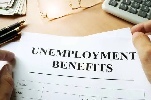 Photo of Unemployment benefits form on a table.