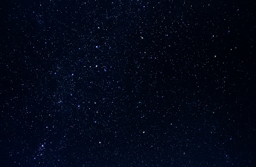 Dark night sky with plenty of stars as background