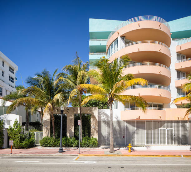istock Miami sidewalk palm trees and apartment building 896987296