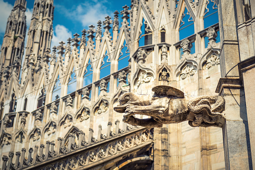 Gargoyle is on the roof of the Milan Cathedral (Duomo di Milano) in Milan, Italy. Milan Duomo is the largest church in Italy and the fifth largest in the world.